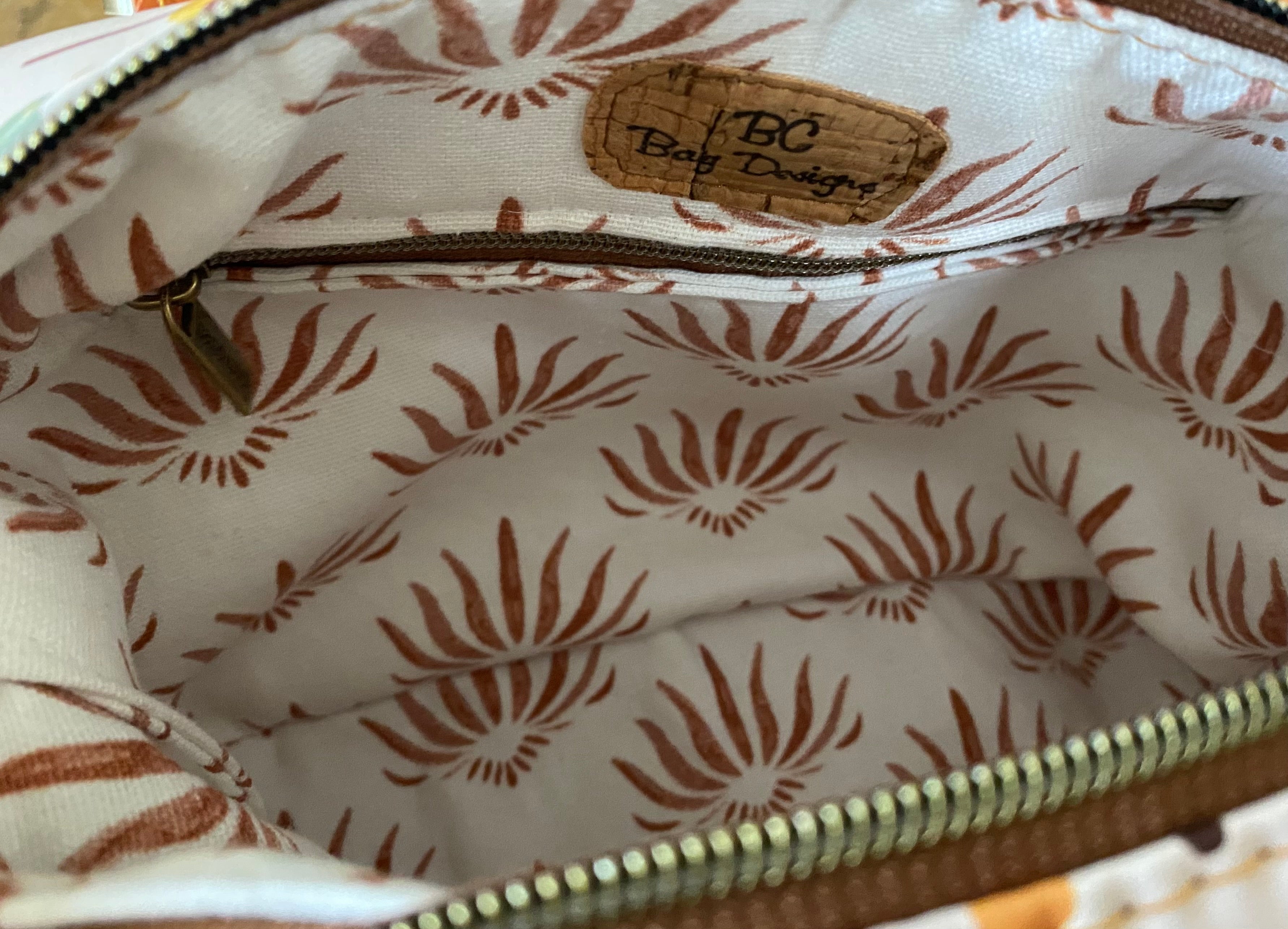 Retro vinyl top handle handbag with pockets and side side clips