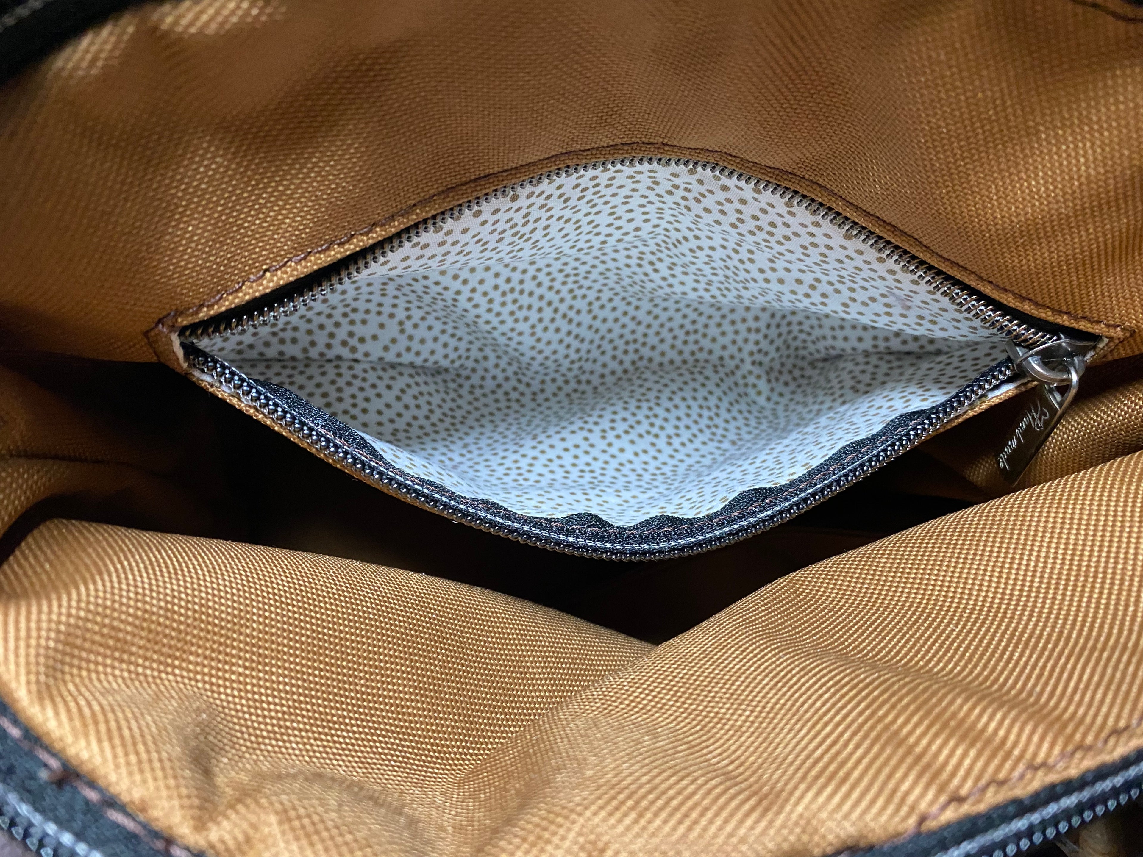 Leather domed handbag, Medieval map theme, inside pocket