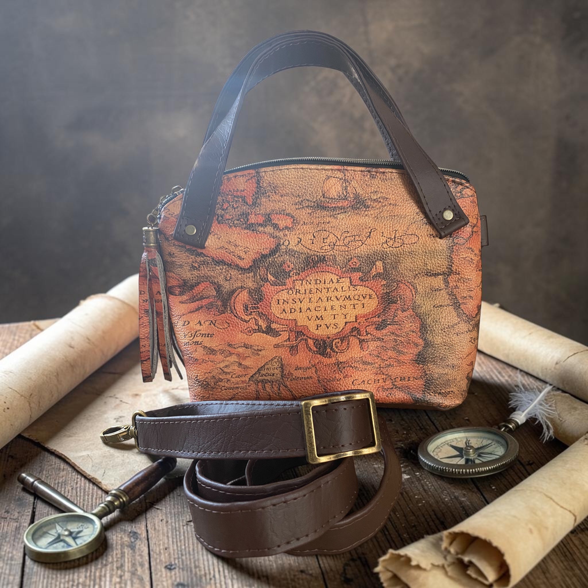 Leather domed handbag, Medieval map theme, inside pocket